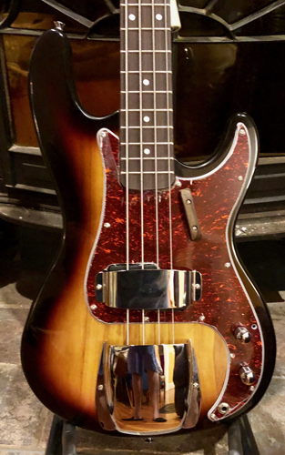 Chrome bridge and pickup covers, tortie pickguard, and period-appropriate rosewood thumb rest!