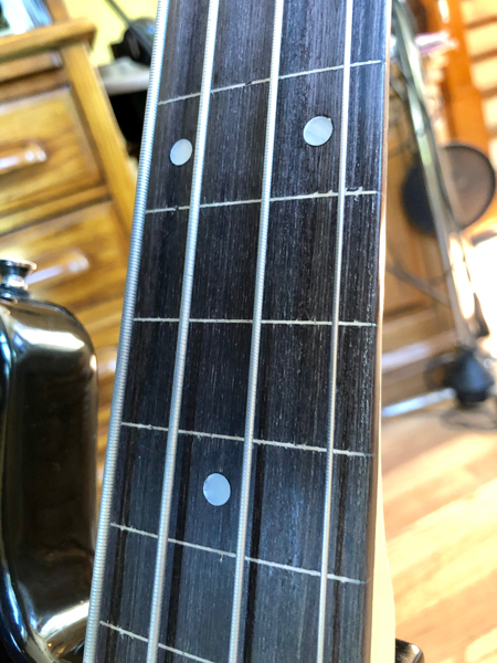 Like Jaco, we pulled the frets and finished the fretless board ourselves. No epoxy here! Lemon oil and D'Addario Chromes.