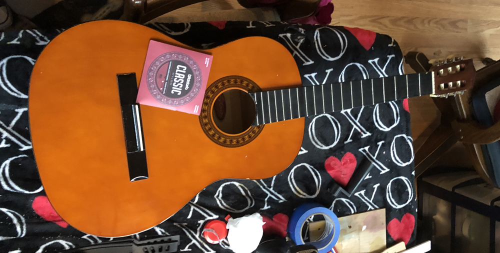 Restringing a Stagg classical guitar with D'Addario Classic nylon strings.