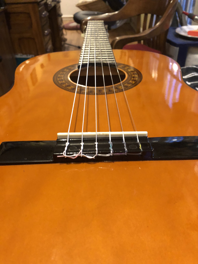 Classical guitar stringing - not bad for a first try!