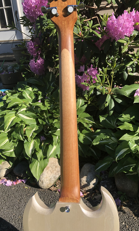 Sandy's neck is hand shaped and finished with tung oil.